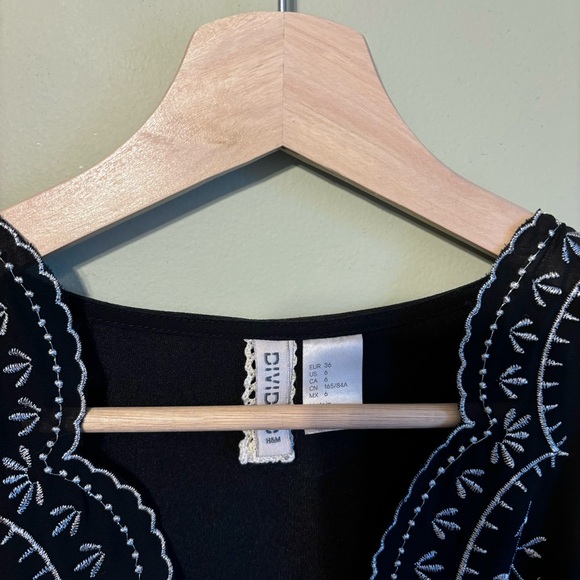 Embroidered black romper - Picture 2 of 2